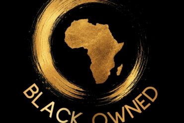 The Heritage Mark identifying Black-owned businesses, featuring a gold silhouette of Africa inside a Zen-inspired brushstroke circle on a black background.